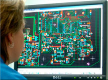 A photo of a person viewing a schematic